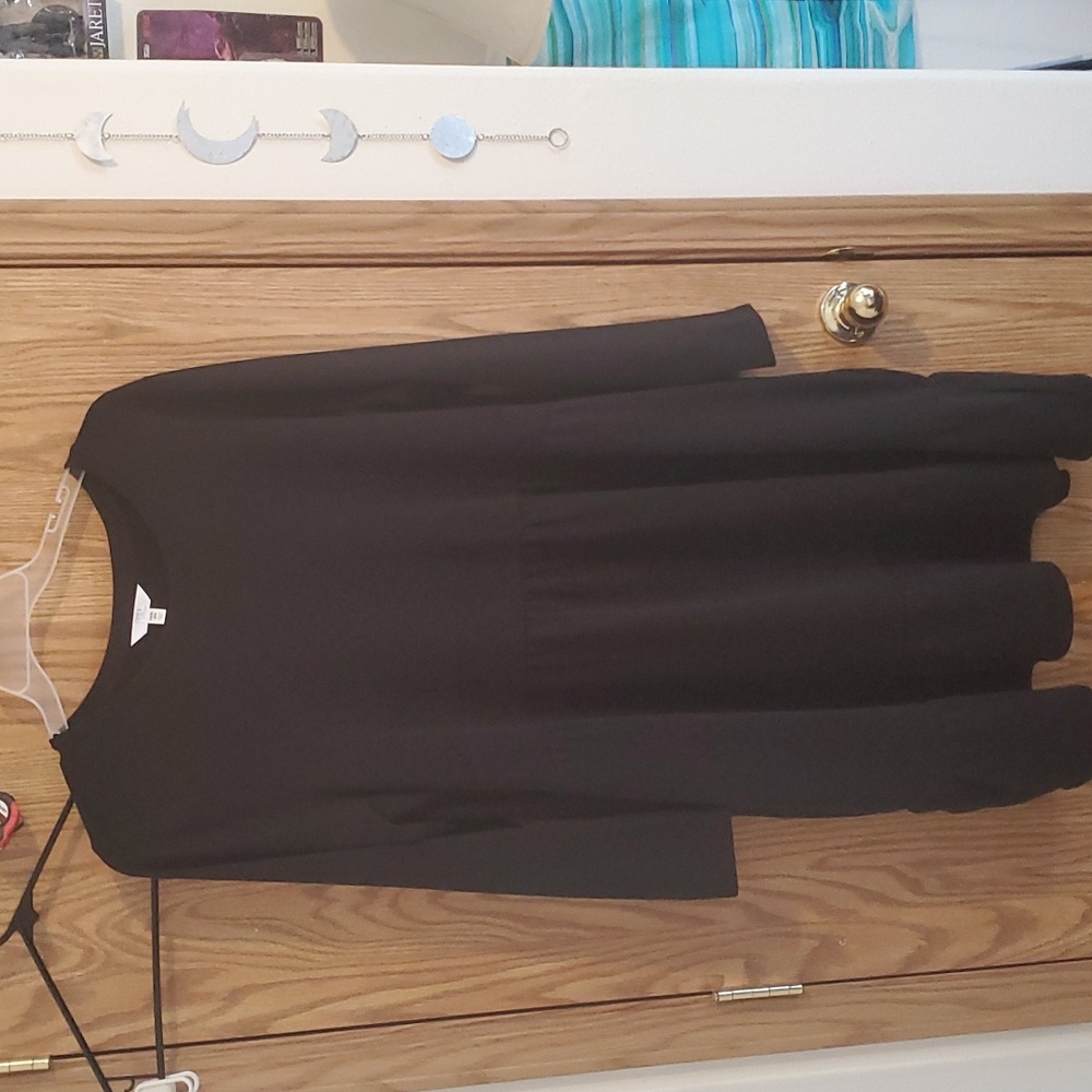 Solid black long sleeved dress